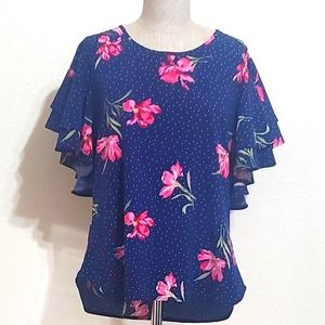 Arnaldo lady wear. Blue and pink flower blouse. Size 8 M